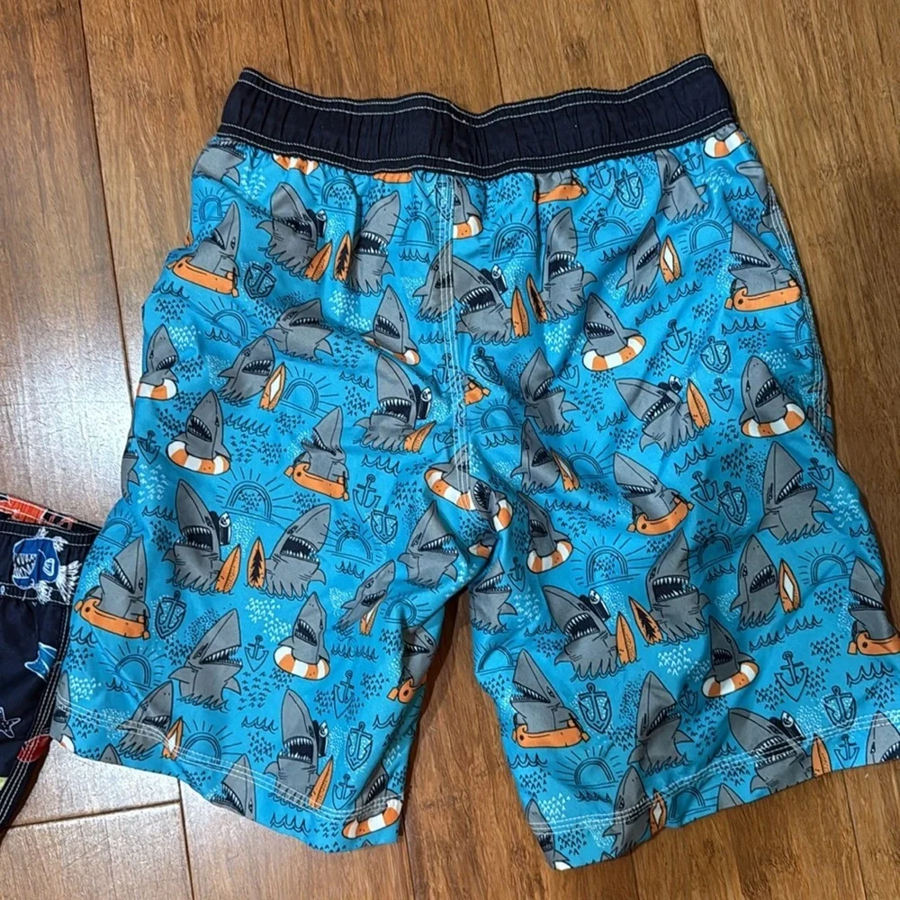 Gymboree boys bundle of swim trunks, sharks, fish, octopus size large (10-12)